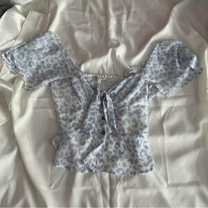 White and Blue Flutter Sleeve Blouse with Tie Front